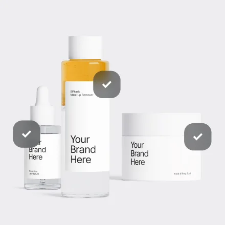 Skincare bottle set labeled "Your Brand Here" with a color-swatch selection interface overlay.